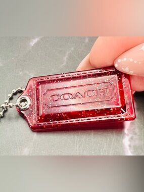 Coach Clear Pink Acrylic Poppy Hangtag Charm with Glitter & Ball Chain. Like New